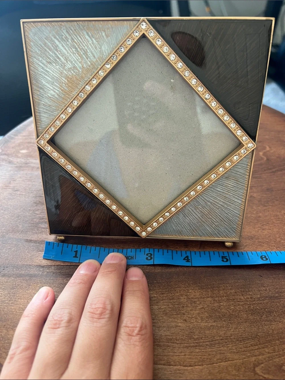 Z Gallerie picture frame features an enamel and crystal-decorated diamond border